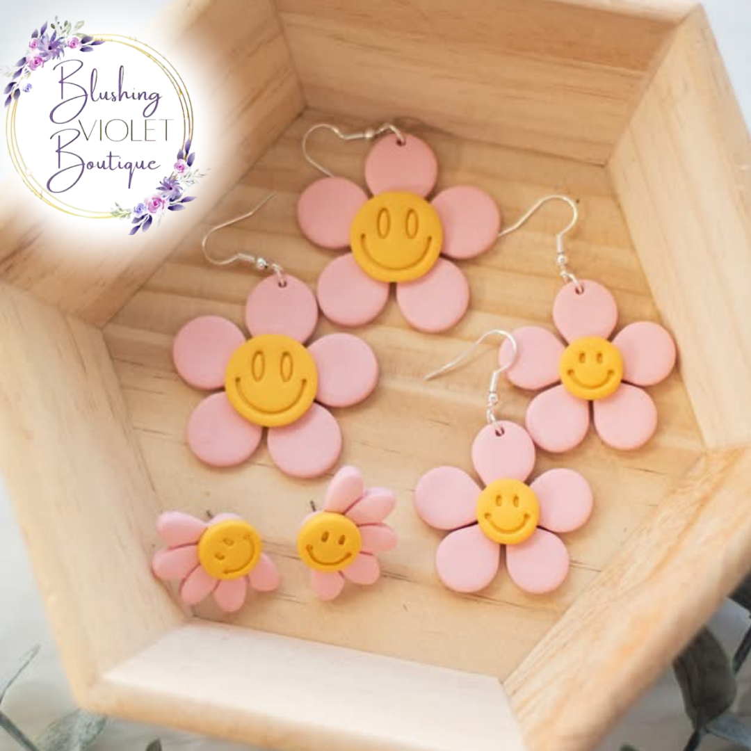 smile flower clay earring collection