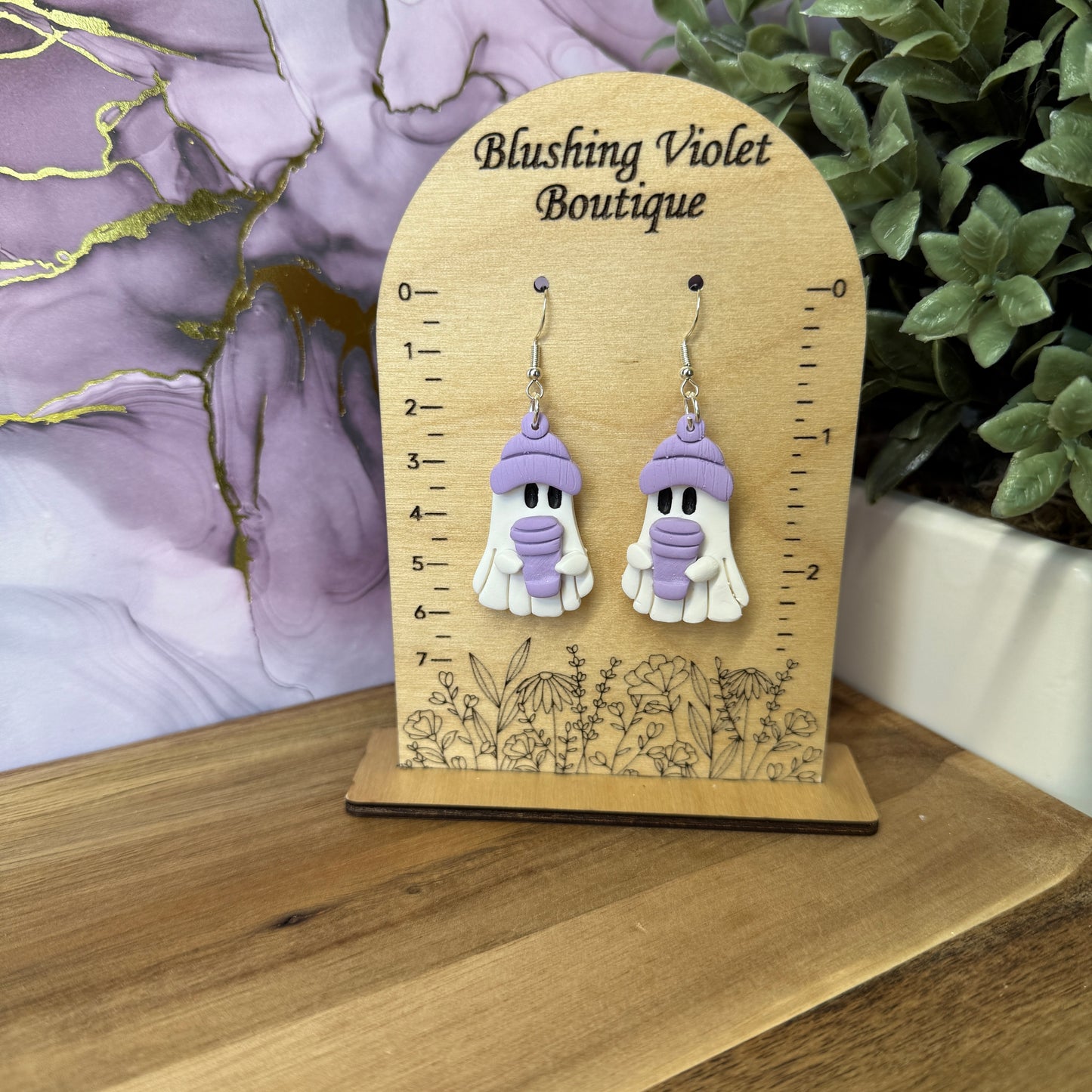Beanie sipping Ghost Clay earring