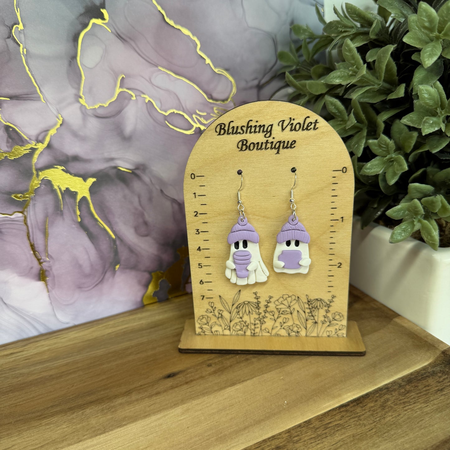 Beanie sipping Ghost Clay earring